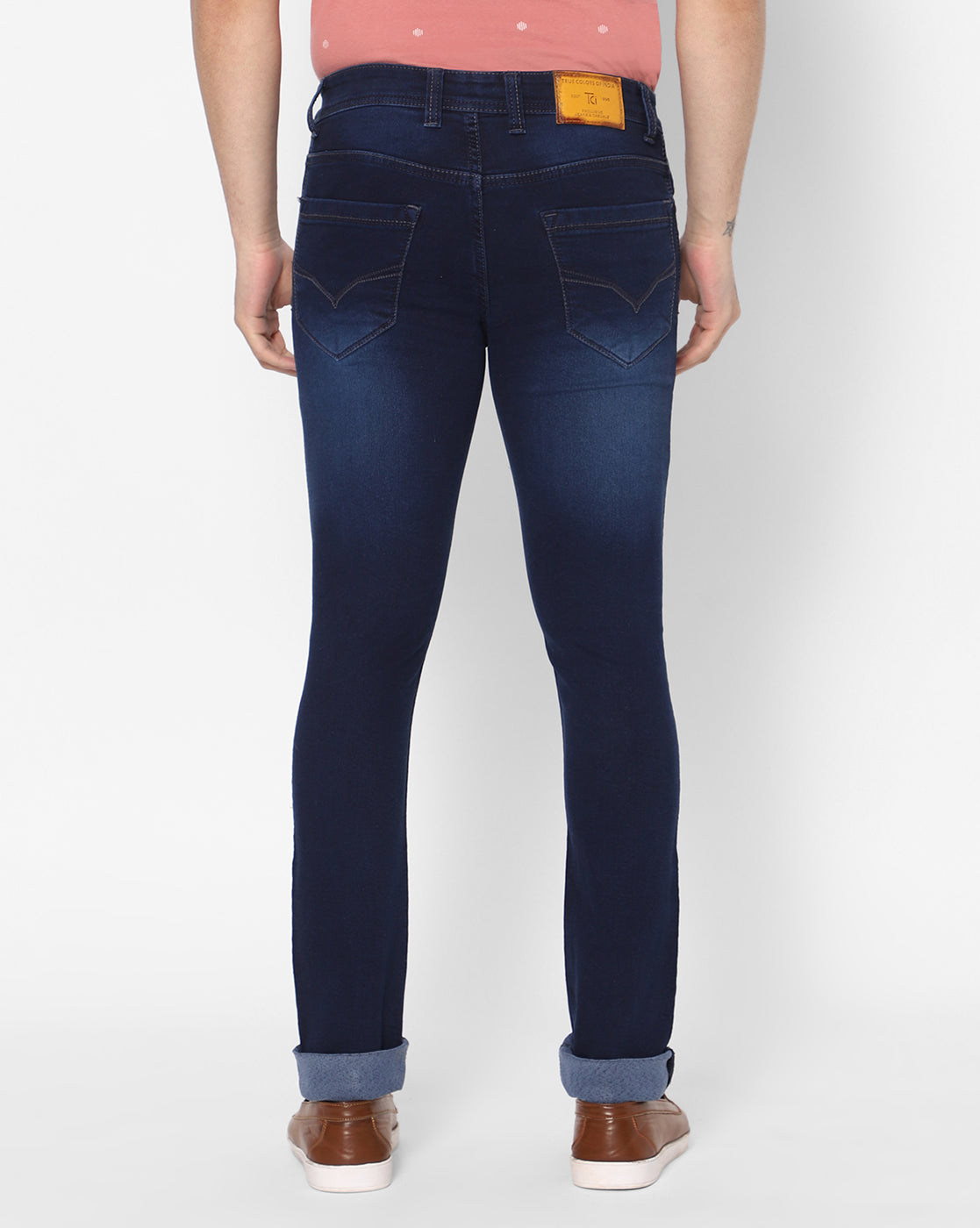 Back view of TCI Men's Regular Fit Dark Blue Jeans, highlighting pocket details and dark blue wash