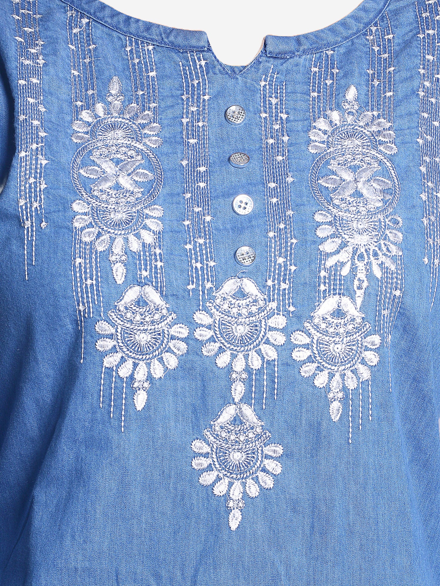 Close-up view of delicate embroidery on the Cefalu Women’s Blue Denim Kurti, showcasing intricate detailing.