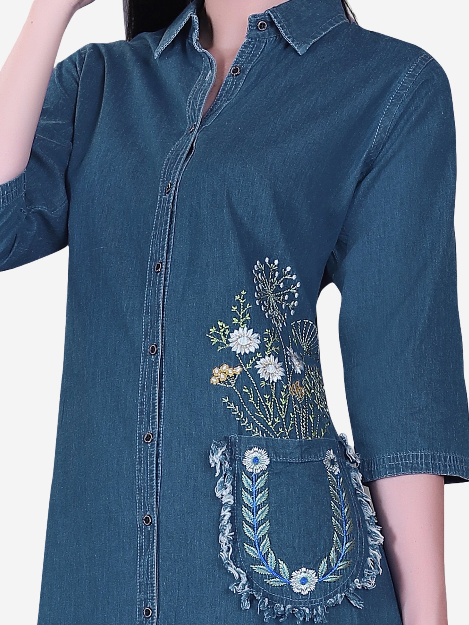 Detailed view of the flower embroidery on the pocket of Cefalu Women’s Dark Blue Denim Kurti.