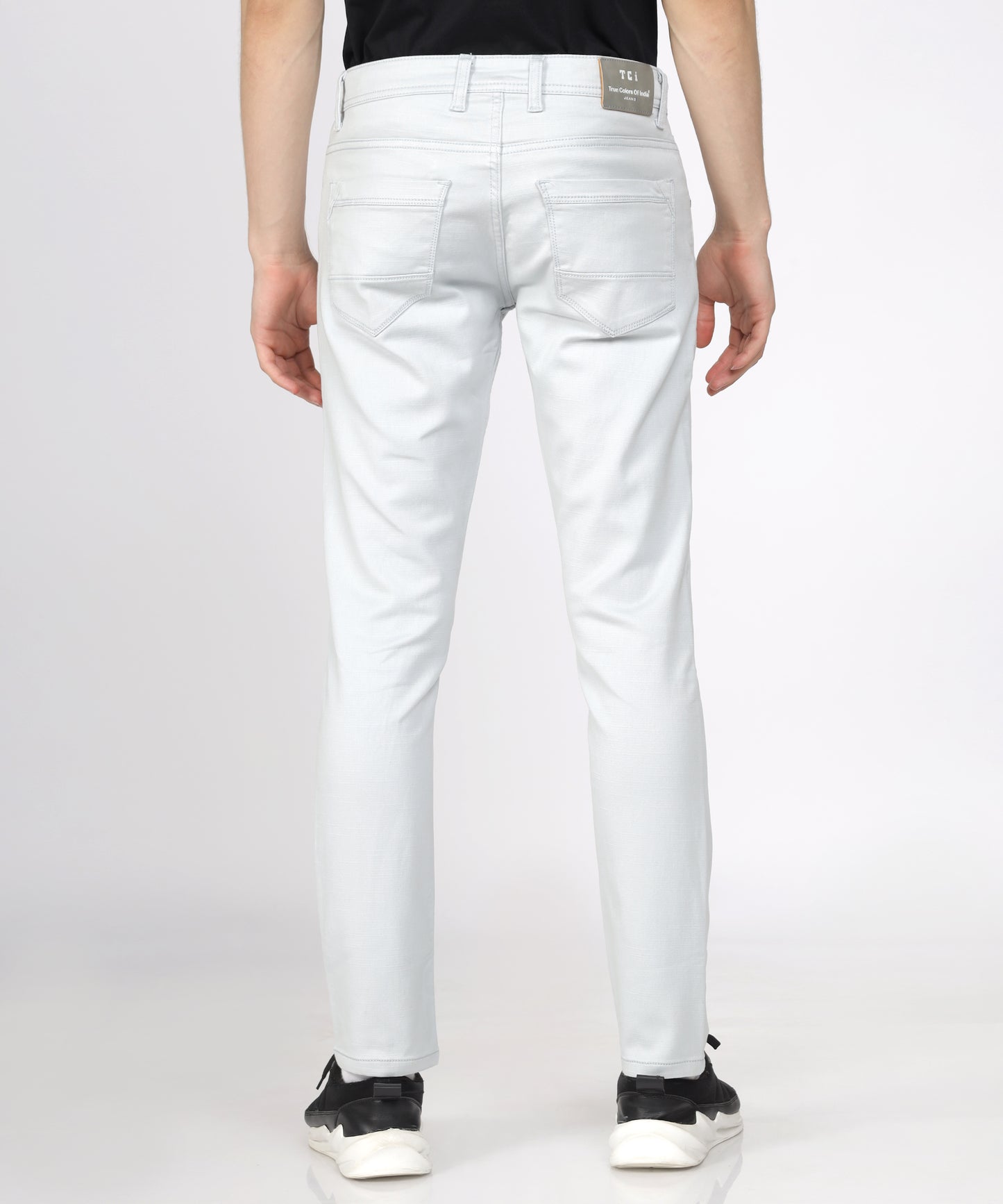 Back view of TCI Men’s Light Pista Regular Fit Trousers displayed.