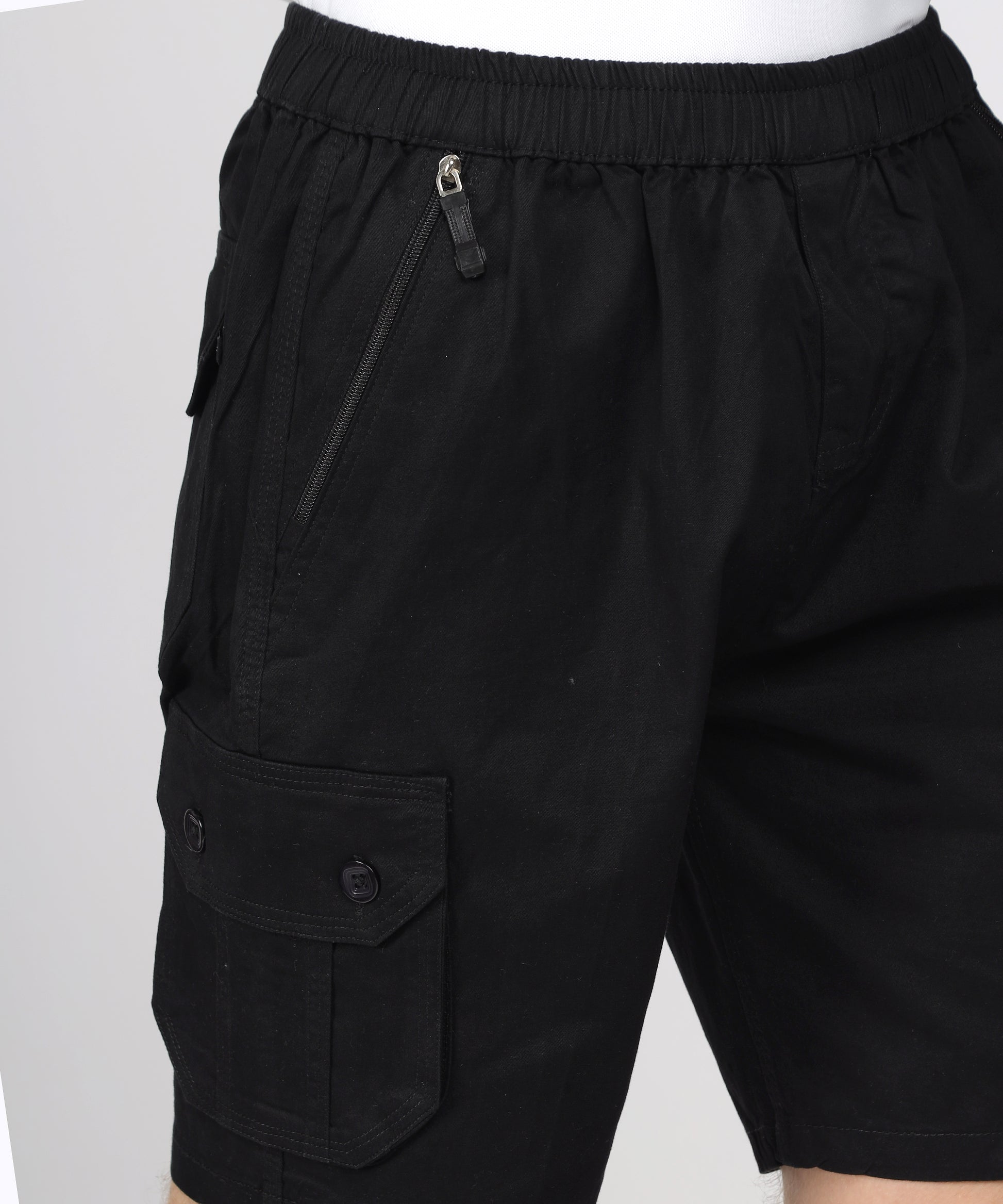 Detail shot of the zip side pockets on TCI Men’s Cargo Bermuda Shorts, showcasing practicality.